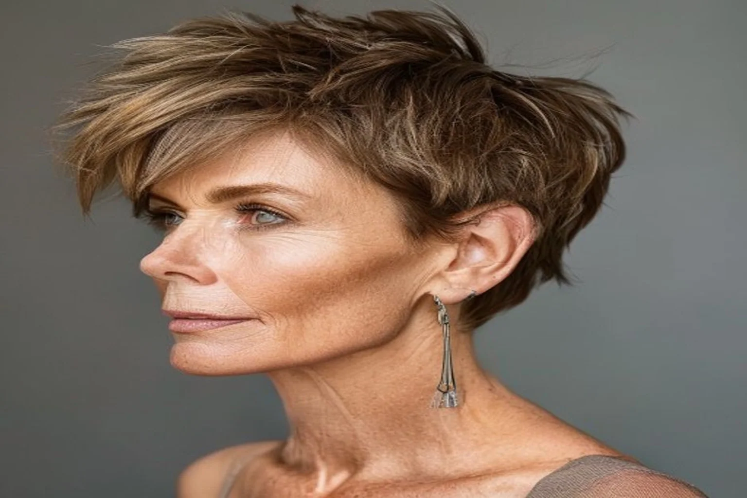 22 Short Haircuts for Women Over 50 That Look Modern 5 tapered pixie with textured top for women over 50