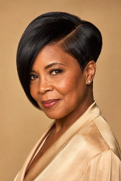 35 Short Haircuts for Black Women Over 50 That Look Stunning in 2026 11 Angled pixie with side part — longer front, shorter back, softens square jawlines