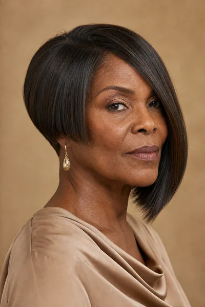 35 Short Haircuts for Black Women Over 50 That Look Stunning in 2026 19 Asymmetrical bob for Black women over 50 — short back to long front, softens square jawlines