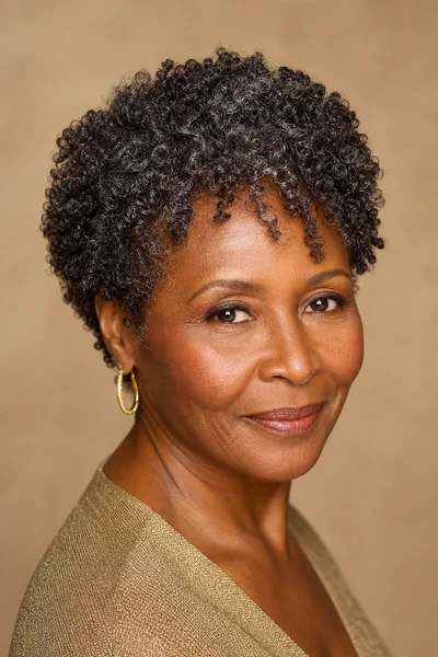35 Short Haircuts for Black Women Over 50 That Look Stunning in 2026 6 Coily crop with defined curls — loose 4a ringlets styled short, best for square faces