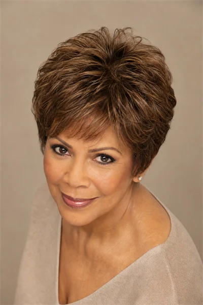 25 Flattering Short Layered Haircuts for Women Over 50 8 volumizing crown-lift pixie for thinning hair on mature woman over 50