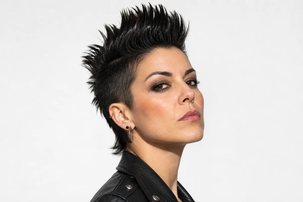 35 Edgy Short Haircuts for Women Ready for a Bold Change 31 Faux mohawk hairstyle styled with gel — spiked center short style without shaving