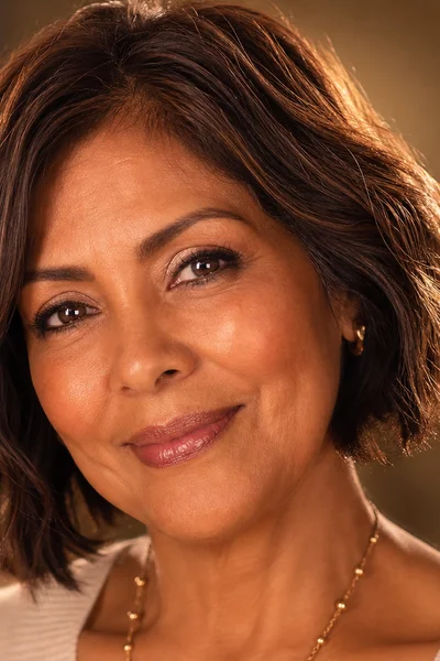 Feathered layered bob for fine hair over 50 — varied layer lengths create soft movement and texture