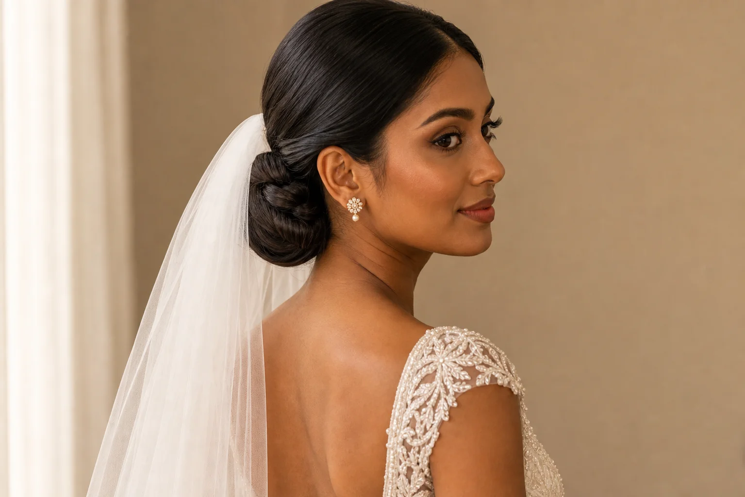 18 Wedding Hairstyles With a Veil You'll Fall in Love With 13 Low bun wedding hairstyle with veil for all face shapes bridal updo