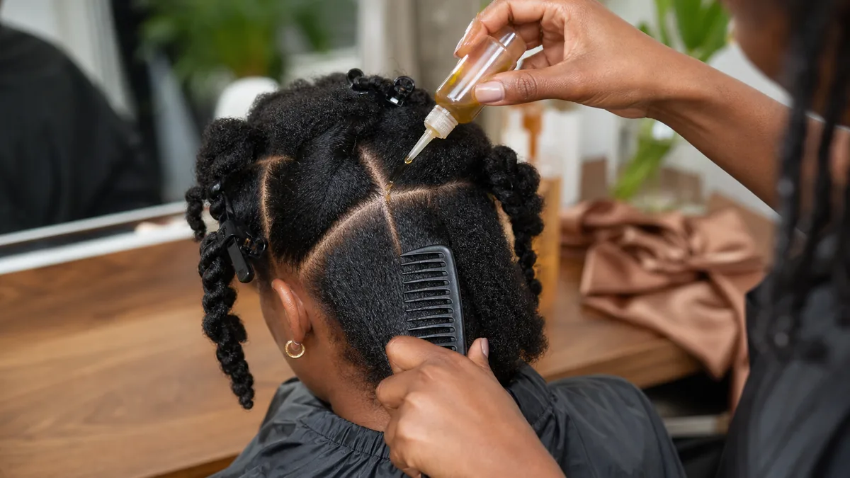 15 Protective Hairstyles for Natural Hair That Promote Growth 4 Natural hair sectioned and prepped before a protective hairstyle install