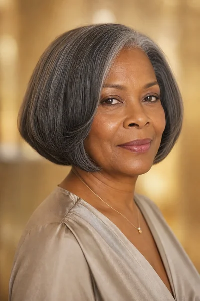 35 Short Haircuts for Black Women Over 50 That Look Stunning in 2026 23 Rounded bob for square faces for Black women over 50 — curved jawline softens strong features