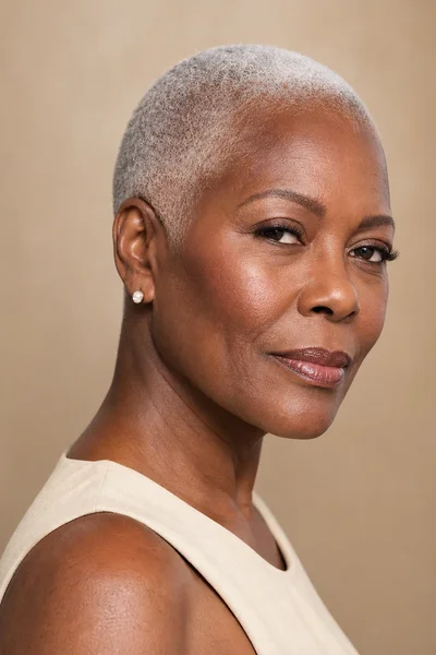 35 Short Haircuts for Black Women Over 50 That Look Stunning in 2026 28 Silver buzz cut for Black women over 50 — fully gray, low-maintenance, works most face shapes and textures