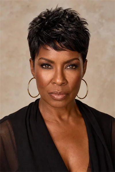 25 Flattering Short Layered Haircuts for Women Over 50 27 textured layered crop for cowlicks on Black woman over 50