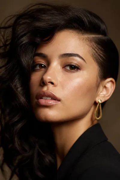 Asymmetrical side-swept updo — directional, editorial prom hairstyle for oval and long faces