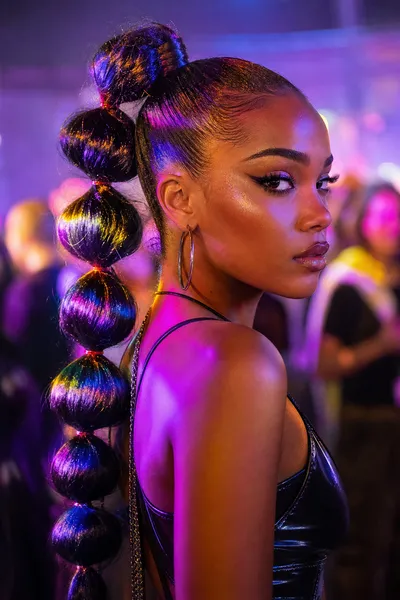 16 Boho Festival Braids for Concert Season 12 bubble braid ponytail — festive rave hairstyle under colorful festival lights