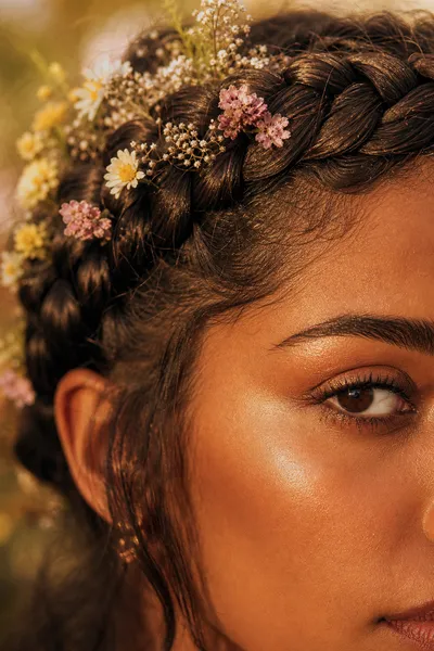16 Boho Festival Braids for Concert Season 5 boho braided crown with flowers — close-up detail of festival braid hairstyle