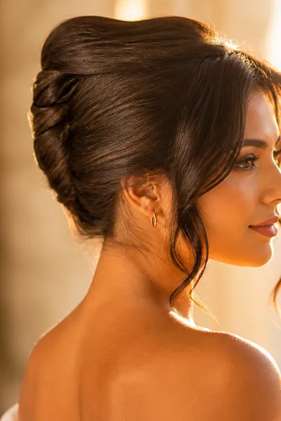 soft French twist prom updo with face-framing curls — classic elegant hairstyle