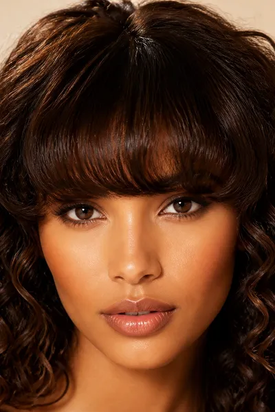 Bottleneck Bangs: The New Trend to Try This Year 5 bardot bangs close-up showing the fuller, softly rounded fringe