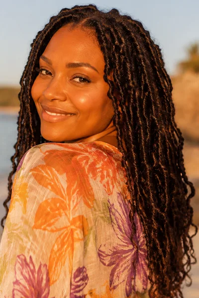 Wavy beach loc hairstyle, relaxed wave pattern for casual dates and outdoor activities